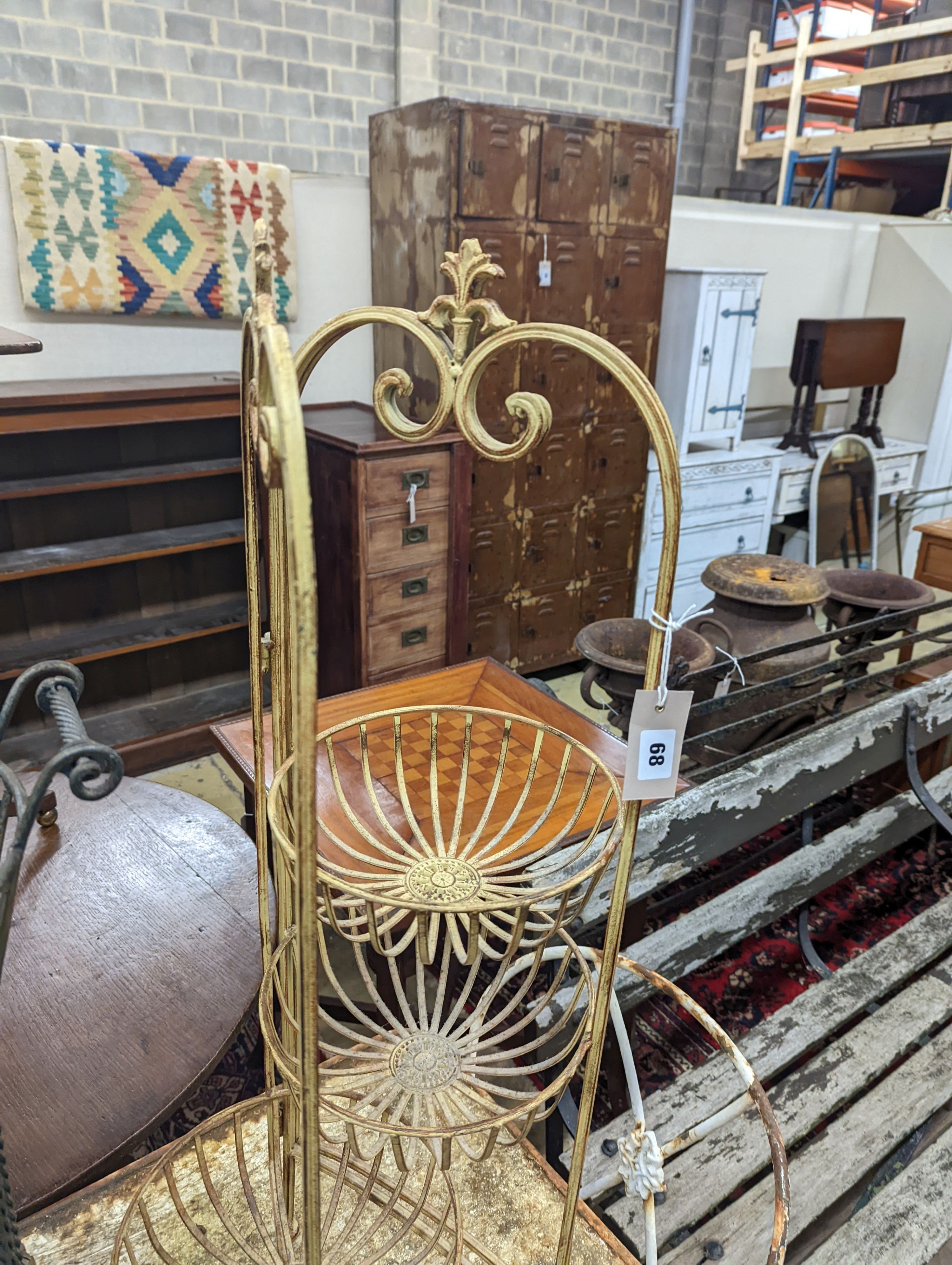 A rattan and wirework stick stand, height 63cm, together with one other folding stand